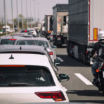Traffic jam on highway cars trucks motorcycle Traffic jam on highway cars trucks motorcycle
